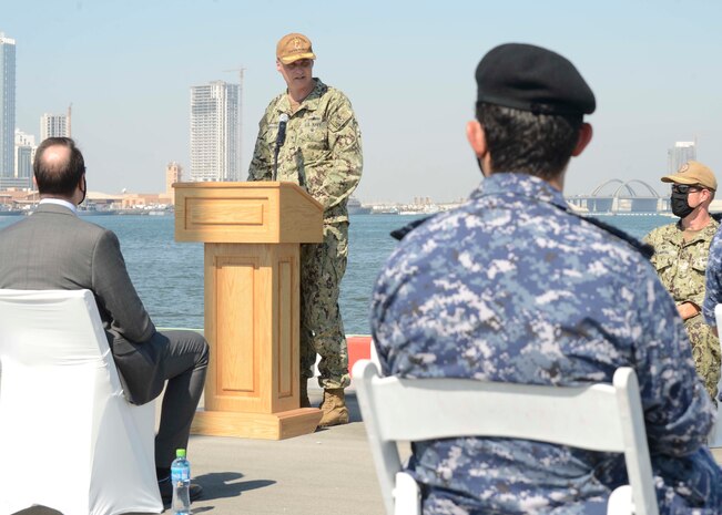 MANAMA, Bahrain (Oct. 21, 2020) Rear Adm. Curt Renshaw, deputy commander, U.S. Naval Forces Central Command, speaks during a ribbon cutting ceremony celebrating the installation of the coalition maritime forces waterfront security barrier at the Mina Salman Pier on board NSA Bahrain. The barrier is the first water-limited obstacle system security barrier system ever installed at an overseas naval installation, and the longest waterside security barrier in the U.S. Navy. NSA Bahrain enables the forward operations and responsiveness of U.S. and allied forces in support of Navy Region Europe, Africa, Central’s mission to provide services to the fleet, warfighter and family. (U.S. Navy photo by Mass Communication Specialist 1st Class Justin Yarborough)