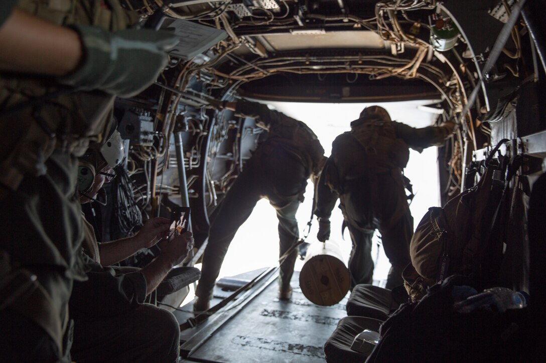 U.S. Marines prepare to deploy an oceanographic sensor at the Pacific Ocean, Calif., Oct. 13.