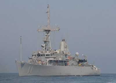 USS Gladiator (MCM 11) steams off the coast of Bahrain. Gladiator is currently participating in mine countermeasure exercises with the Bonhomme Richard Expeditionary Strike Group (BHRESG). BHRESG is conducting maritime security operations (MSO) in the U.S. 5th Fleet area of responsibility. MSO help set the conditions for security and stability in the maritime environment and complement the counter-terrorism and security efforts in regional nations&amp;#65533; littoral waters. Coalition forces also conduct MSO under international maritime conventions to ensure security and safety in international waters so that commercial shipping and fishing can occur safely in the region. (U.S. Navy photo/Petty Officer 3rd Class Mark Patterson II)