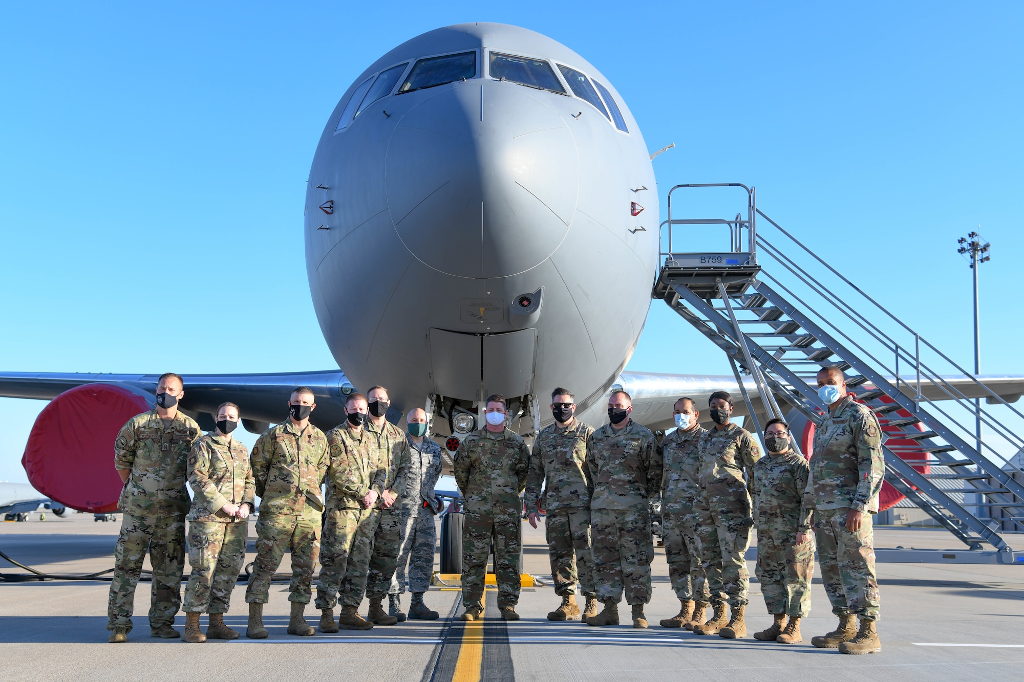 Airmen participating in the Wing Squadron Superintendent Course pose for a photo in front of a KC-46 Pegasus Oct. 14, 2020, at McConnell Air Force Base, Kansas. The purpose of the course is to provide tools to develop solution-minded, operational and strategic-level thinking squadron superintendents required in today’s and tomorrow’s Air Force.  (U.S. Air Force photo by Airman 1st Class Nilsa Garcia)