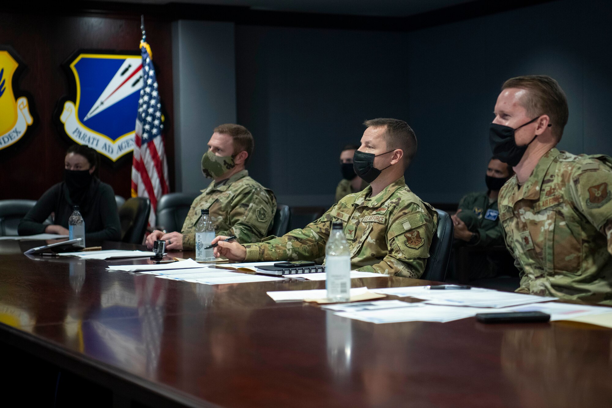 A panel of judges listen to an innovation pitch during a Spark Tank competition, at Whiteman Air Force Base, Missouri, Oct. 9, 2020. Whiteman Spark Tank is a competition where Airmen pitch their innovative ideas to a panel of wing and community leadership. Eleven ideas were pitched and the judges selected two to compete at the Air Force Global Strike Command’s Spark Tank competition. (U.S. Air Force photo by Staff Sgt. Dylan Nuckolls)