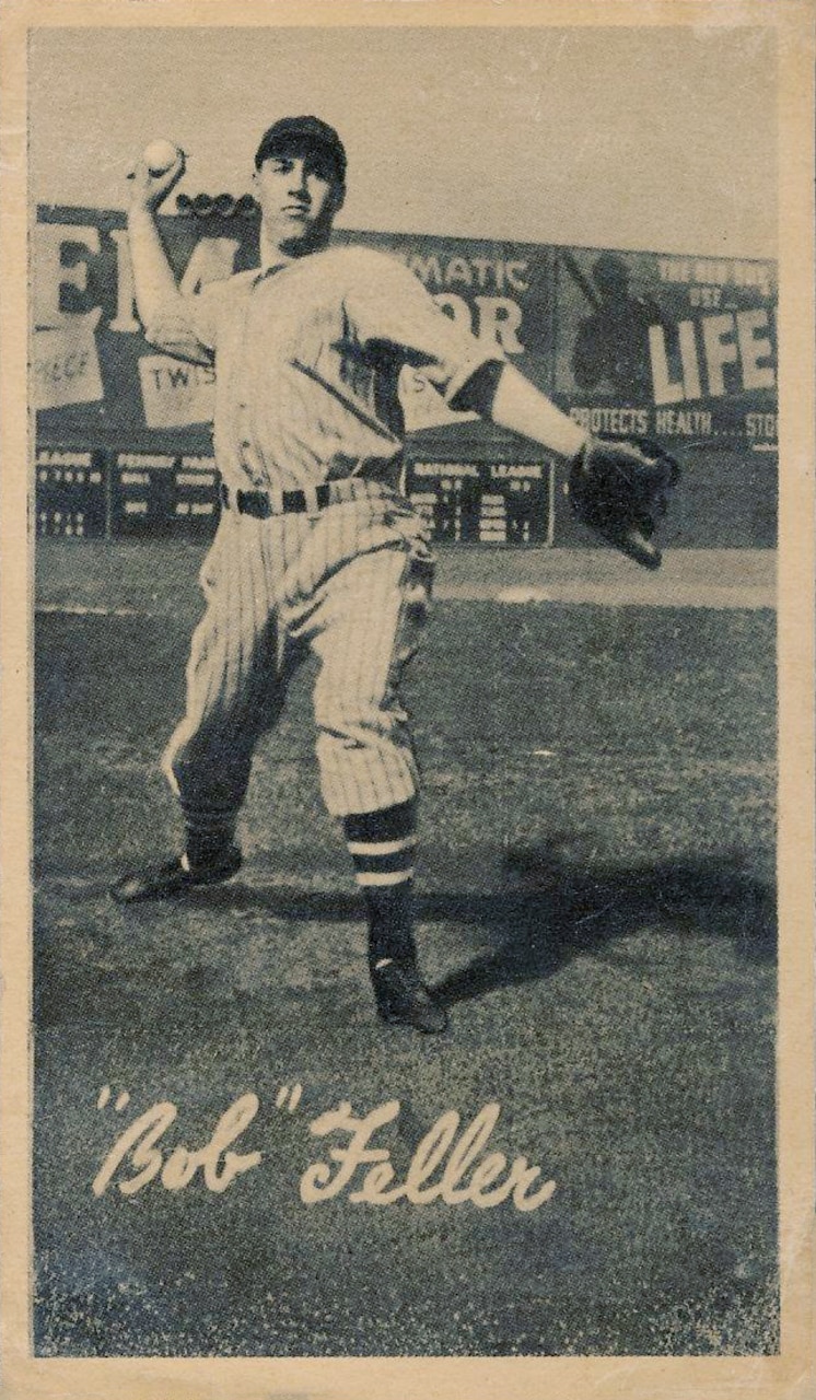 A baseball player pitches a ball.