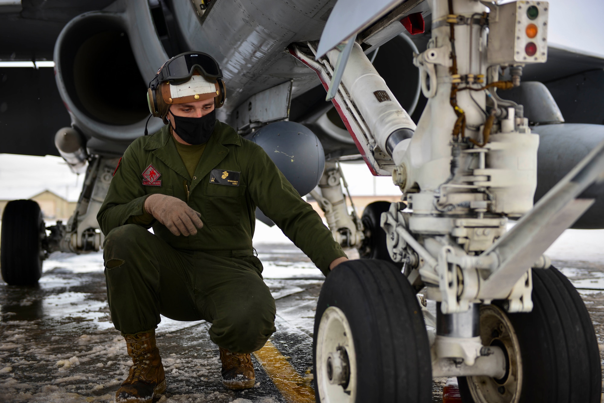U.S. Marine Corps Cpl. Jeremy Waggoner, Jr., a Marine Fighter Attack Squadron (VMFA) 232 plane captain, inspects the aircraft prior to take off during RED FLAG-Alaska 21-1 at Eielson Air Force Base, Alaska, Oct. 20, 2020.
