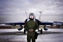U.S. Marine Corps Cpl. Jeremy Waggoner, Jr., a Marine Fighter Attack Squadron (VMFA) 232 plane captain, stands by as a pilot prepares to taxi during RED FLAG-Alaska 21-1 at Eielson Air Force Base, Alaska, Oct 20, 2020.