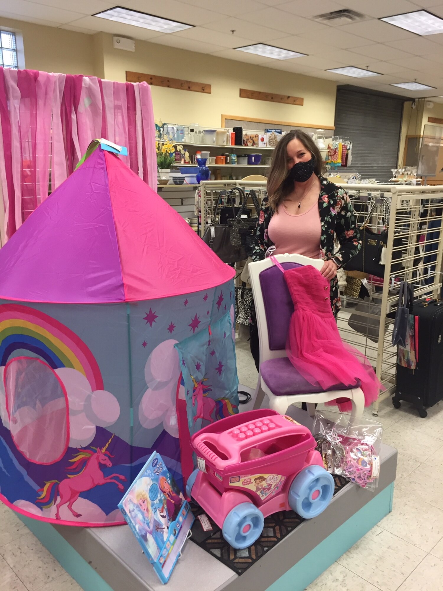 Thrift Shop manager Beth Newberry prepares a display of children’s items. The Wright-Patterson Officers’ Spouses’ Club consulted with the 88th Medical Group’s Public Health Flight and instituted a number of COVID-19 measures before reopening the shop. SKYWRIGHTER PHOTO/AMY ROLLINS