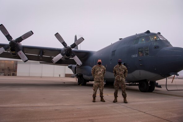 Master Sgt. Kevin Shafer, 16th Aircraft Maintenance Unit crew chief section chief, left, and Staff Sgt. Joshua Ohienmhen, 16 AMU Non-Commissioned Officer in charge, stand in front of an AC-130W Stinger II gunship, Tail No. 1303, prior to the aircraft’s final flight before retirement at Cannon Air Force Base, N.M., Oct. 19, 2020. Shafer was Tail No. 1303’s Dedicated Crew Chief in 2009 while Ohienmhen served as the most recent DCC for the aircraft. (U.S. Air Force photo by Staff Sgt. Luke Kitterman)