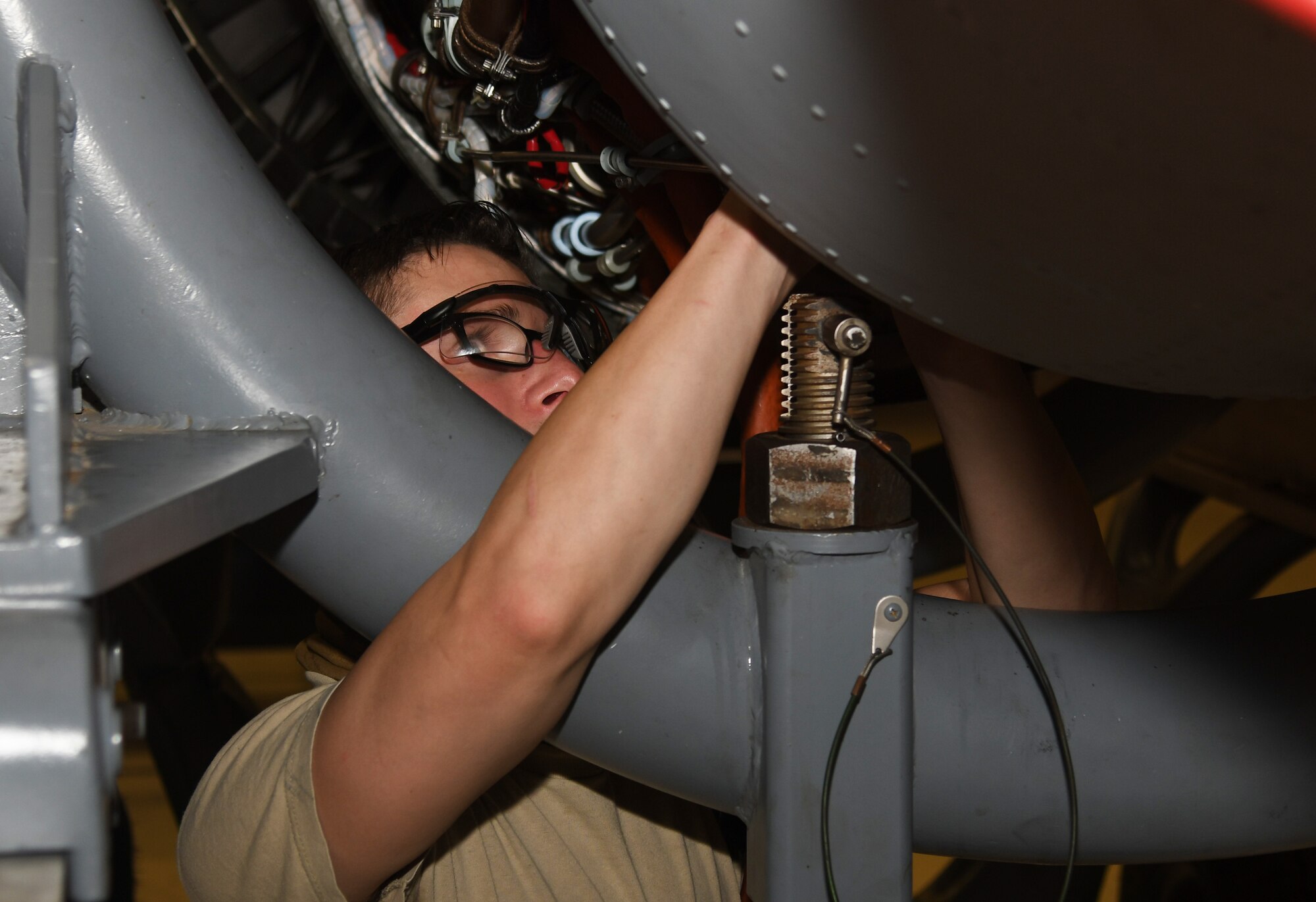 A maintainer fixes an engine.