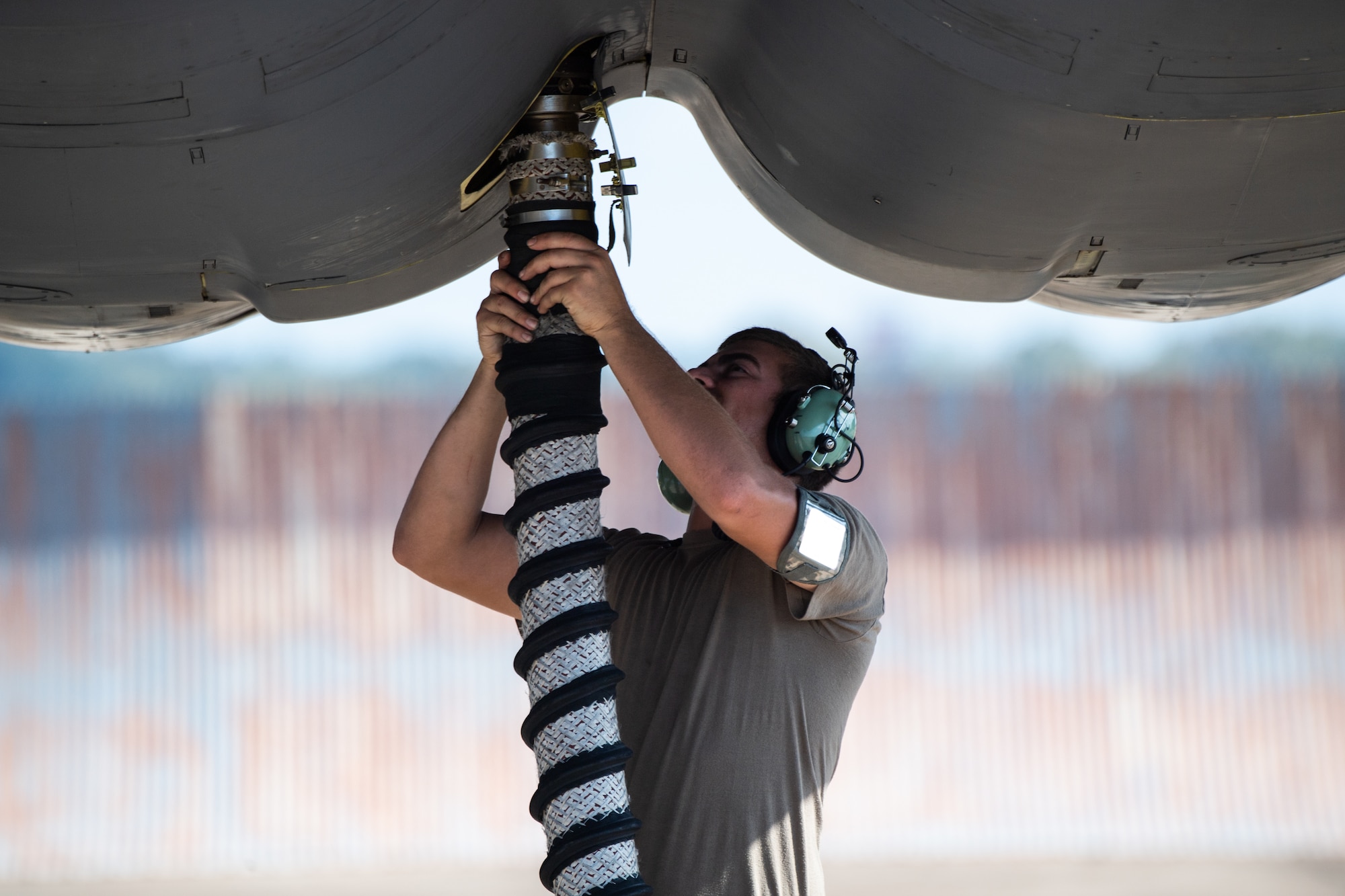 Airman 1st Class Nicholas Casillas, 96th Aircraft Maintenance Unit crew chief, detaches a fuel hose from a B-52H Stratofortress during Global Thunder 21 at Barksdale Air Force Base, La., Oct. 22, 2020.