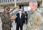 (From left) Maj. Gen. Miranda Filho, J.M. Harmon III and Maj. Gen. Dennis LeMaster discus future education and training opportunities between the two countries during the Brazilian delegation visit.