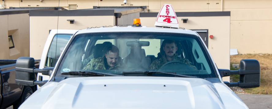 Capt. Noah Spitler is a B-52 instructor pilot for the 69th Bomb Squadronat Minot Air Force Base, on Oct. 17, 2020. Spitler may wait for hours at a time until a mission starts. As soon as they are alerted, he and his team rush to their vehicles to get to their B-52s as fast as possible. He says that his coworkers and friends in the Alert Shack are who make it all worth it.(U.S. Air Force photo by Airman 1st Class Caleb S. Kimmell)