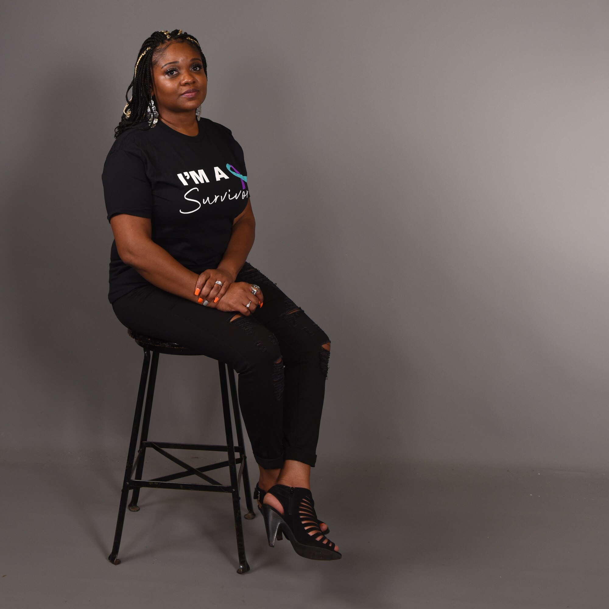 Eva Denson, Military Family Support Liaison for Workforce Solutions and also a member of Goodfellow, advocates for domestic violence awareness and shares her survival story in the Public Affairs photo studio, on Goodfellow Air Force Base, Texas, Oct. 22, 2020. Denson’s story wasn’t an outlying incident, approximately 44% of full-time employed adults in the U.S. reported experiencing domestic violence in their workplace. October 2020, is National Domestic Violence Awareness Month, declared by U.S. President Donald J. Trump. (U.S. Air Force photo by Senior Airman Abbey Rieves)