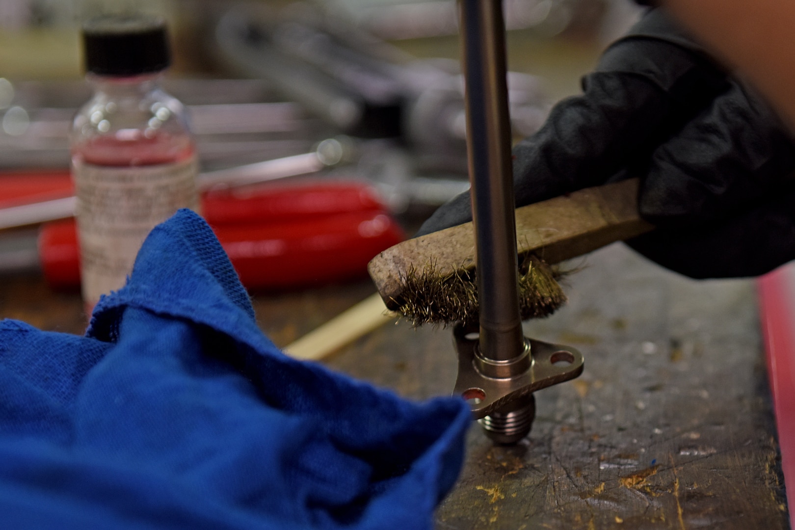 An Airman assigned to the 48th Fighter Wing cleans a tool at Royal Air Force Lakenheath, England, Oct. 5, 2020. The Materiel Management flight practices flexibility through embedding supply Airmen within various maintenance squadrons. (U.S. Air Force photo by Airman 1st Class Rhonda Smith)