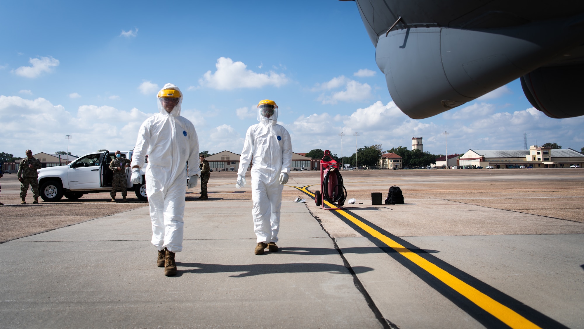 Airman 1st Class William Archer and Staff Sgt. Jeremy Caraan, 96th Aircraft Maintenance Unit crew chiefs prepare to disinfect a B-52H Stratofortress during Global Thunder 21 at Barksdale Air Force Base, La., Oct. 22, 2020.