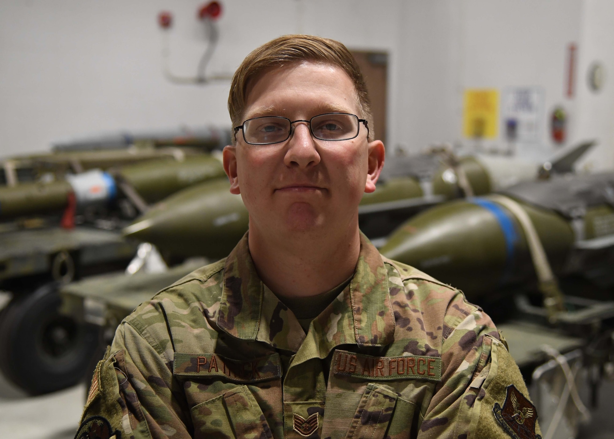 SSgt. William Patrick is a weapons specialist team chief for the 5th Aircraft Maintenance Squadron at Minot Air Force Base, on Oct. 21, 2020. Patrick and the three Airmen that he oversees have spent eight hours loading a full aircraft during the Prairie Vigilance exercise. As a team chief, he is his team’s source for information. They will come to him for questions or guidance on anything pertaining to their weapons systems (U.S. Air Force photo by Airman 1st Class Caleb S. Kimmell)