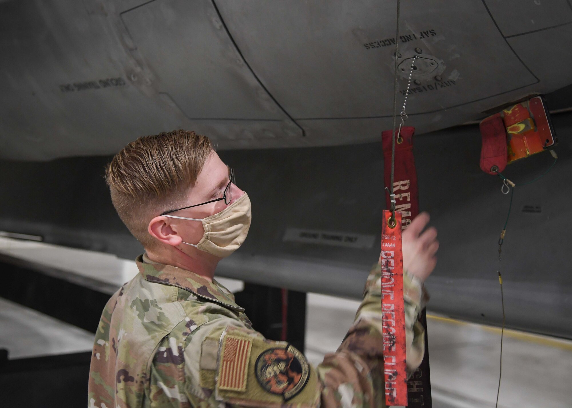 SSgt. William Patrick is a weapons specialist team chief for the 5th Aircraft Maintenance Squadron at Minot Air Force Base, on Oct. 21, 2020. Patrick and the three Airmen that he oversees have spent eight hours loading a full aircraft during the Prairie Vigilance exercise. As a team chief, he is his team’s source for information. They will come to him for questions or guidance on anything pertaining to their weapons systems (U.S. Air Force photo by Airman 1st Class Caleb S. Kimmell)