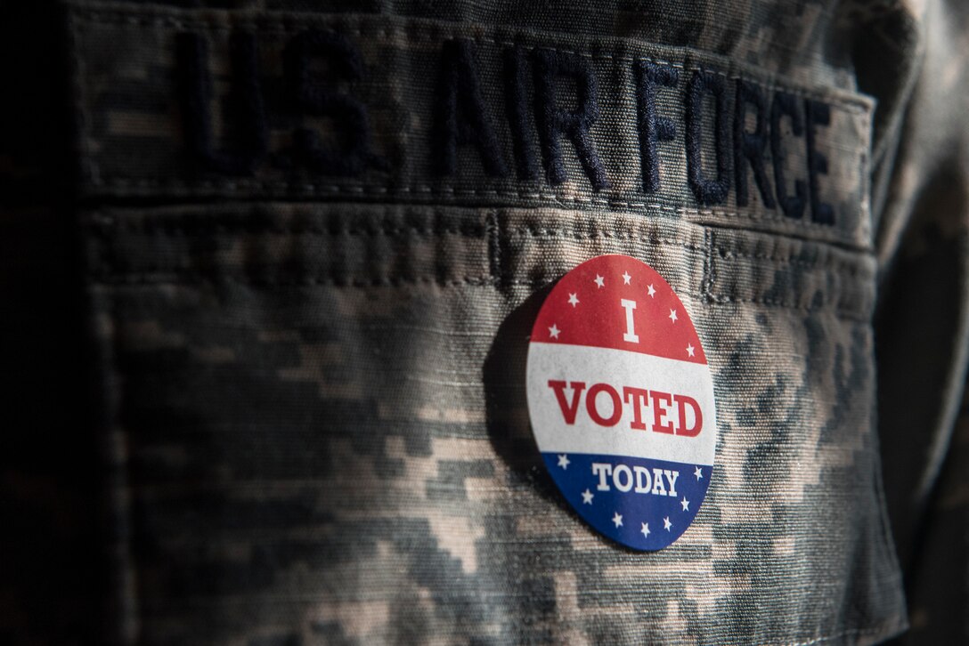 An ABU top with an I voted sticker on it.