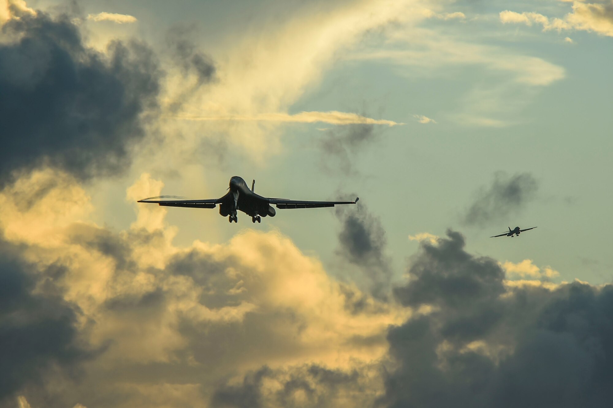Two B-1B Lancer aircraft prepare to land during a Bomber Task Force deployment at Andersen Air Force Base, Guam, Oct. 21, 2020.