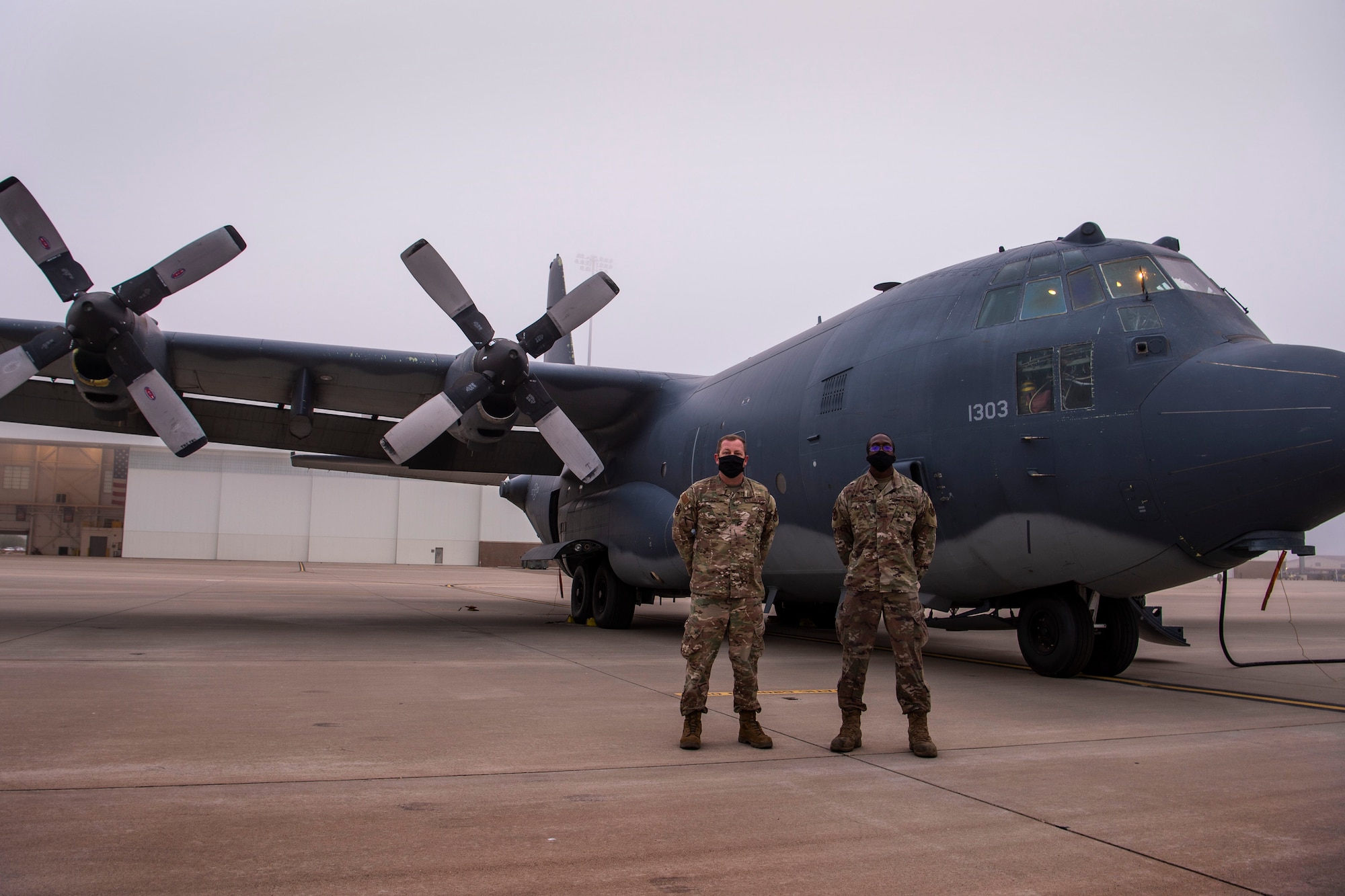 Master Sgt. Kevin Shafer, 16th Aircraft Maintenance Unit crew chief section chief, left, and Staff Sgt. Joshua Ohienmhen, 16 AMU Non-Commissioned Officer in charge, stand in front of an AC-130W Stinger II gunship, Tail No. 1303, prior to the aircraft’s final flight before retirement at Cannon Air Force Base, N.M., Oct. 19, 2020. Shafer was Tail No. 1303’s Dedicated Crew Chief in 2009 while Ohienmhen served as the most recent DCC for the aircraft. (U.S. Air Force photo by Staff Sgt. Luke Kitterman)