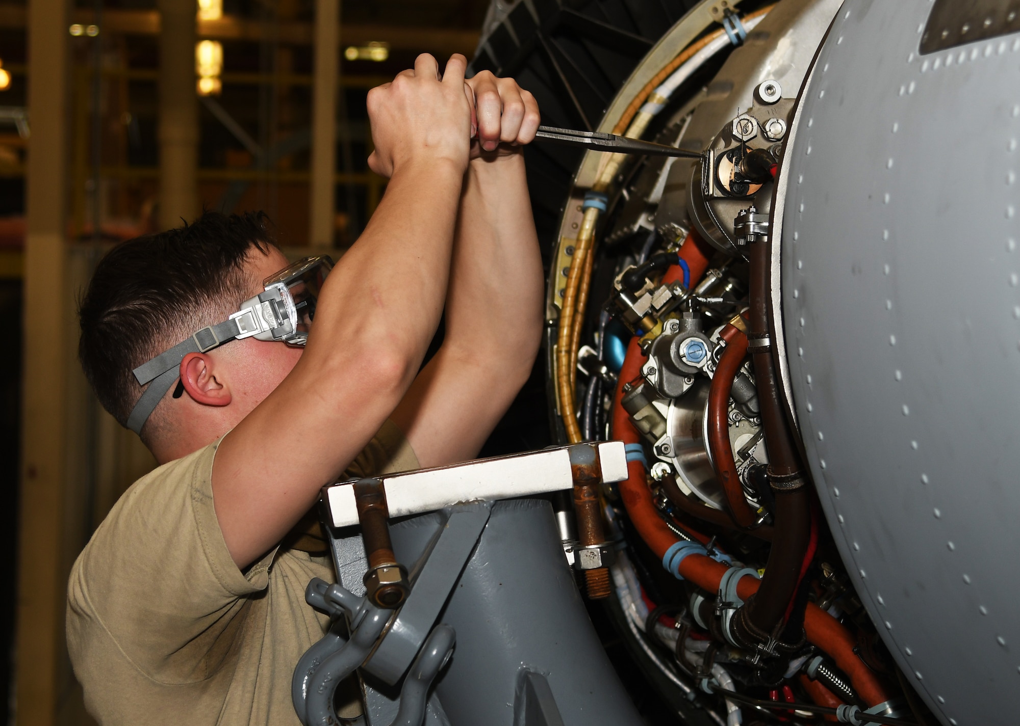 A maintainer fixes an engine.