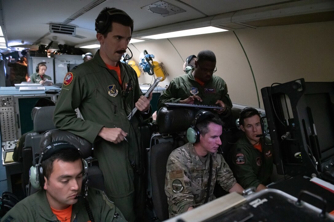 U.S. Airmen from the 961st Airborne Air Control Squadron monitor indication friend or foe systems aboard an E-3 Sentry during Exercise WestPac Rumrunner Oct. 16, 2020, out of Kadena Air Base, Japan. The 961st AACS was a critical piece of the exercise, which focused on defensive counter air capabilities and joint interoperability using agile combat employment concepts. ACE is the cornerstone of the wing’s operating concept. It enables forces to operate from locations with varying levels of capacity & support, ensuring multi-functional Airmen are postured in a position of advantage to generate combat power. (U.S. Air Force photo by Staff Sgt. Peter Reft)