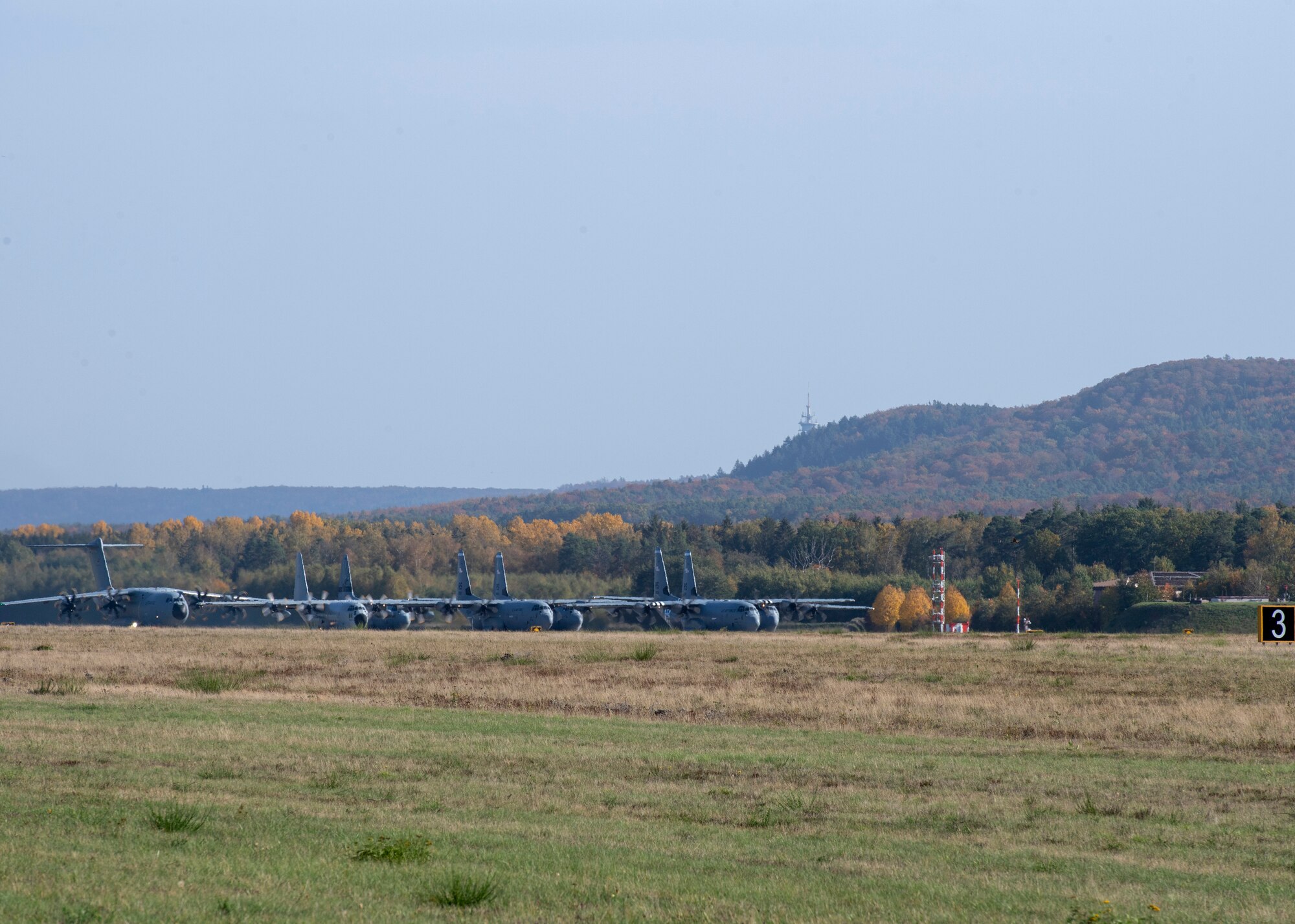 Photo of aircraft preparing to take off in formation