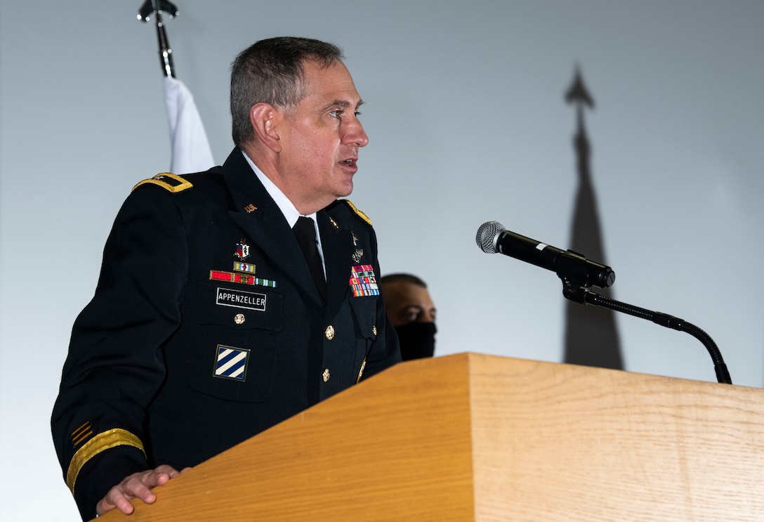 U.S. Army Brig. Gen. George Appenzeller, Defense Health Agency assistant director, gives a speech during the Armed Forces Medical Examiner System change of directorship ceremony at Dover Air Force Base, Delaware, Oct. 21, 2020. AFMES provides the Department of Defense and other federal agencies comprehensive forensic investigative services, to include forensic pathology, DNA forensics, forensic toxicology and medical mortality surveillance. (U.S. Air Force photo by Senior Airman Christopher Quail)