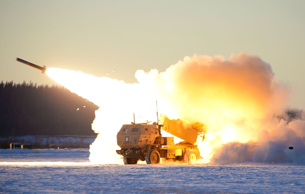 A U.S. Army M142 High Mobility Artillery Rocket Systems (HIMARS) launches ordnance during RED FLAG-Alaska 21-1 at Fort Greely, Alaska, Oct. 22, 2020. This exercise focuses on rapid infiltration and exfiltration to minimize the chance of a counterattack. (U.S. Air Force photo by Senior Airman Beaux Hebert)