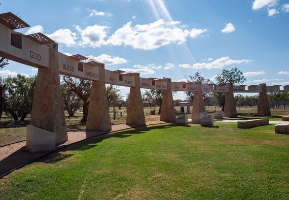 Photo depicts the Dyess Memorial Park from the front, midday.