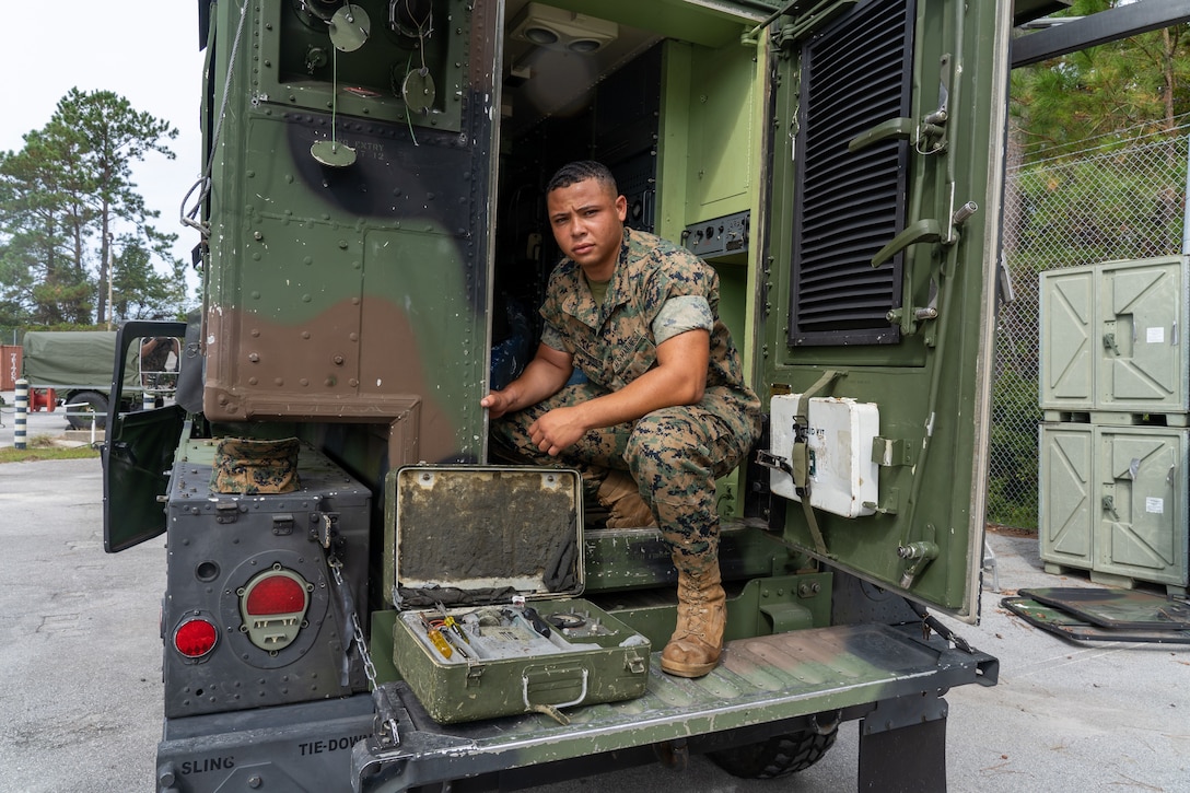 Lance Cpl. Kaleb Parker, a tropospheric scatter radio multi-channel equipment operator with General Support Company, 8th Communication Battalion, II Marine Expeditionary Force Information Group, poses for a photo on Camp Lejeune, October, 2020. “Ask questions. Don’t be afraid to take charge, it’s okay to stand out,” said Parker, a Norwood, N.Y., native. According to his leadership, Parker works diligently and frequently takes initiative to complete tasks that are beyond his scope as a junior Marine. Parker also exhibits that he is a team player and willing to assist others to complete the mission. Parker recently earned the Navy Marine Corps Achievement Medal for superior performance in duties as a tropospheric scatter radio multi-channel equipment operator during the TRC Field Exercise where he was instrumental in testing the operability of 12 Radio Terminal Sets valued at $18 million in total. Lance Corporal Parker was also won Marine of the Quarter for 8th Comm. Bn. and was submitted for II MIG Marine of the Quarter. Parker’s role as the Company Embarkations Representative was integral in isolating the equipment necessary for MEFEX 21.2. Parker identified 171 line items valuing over $5 million to be packed and transported to Fort A.P. Hill, V.A. (U.S. Marine Corps photo by Lance Cpl. Armando Elizalde)