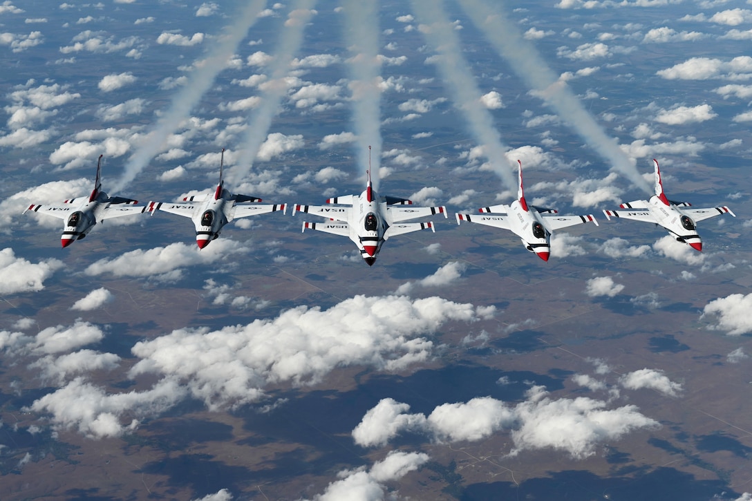 Six aircraft perform midair.
