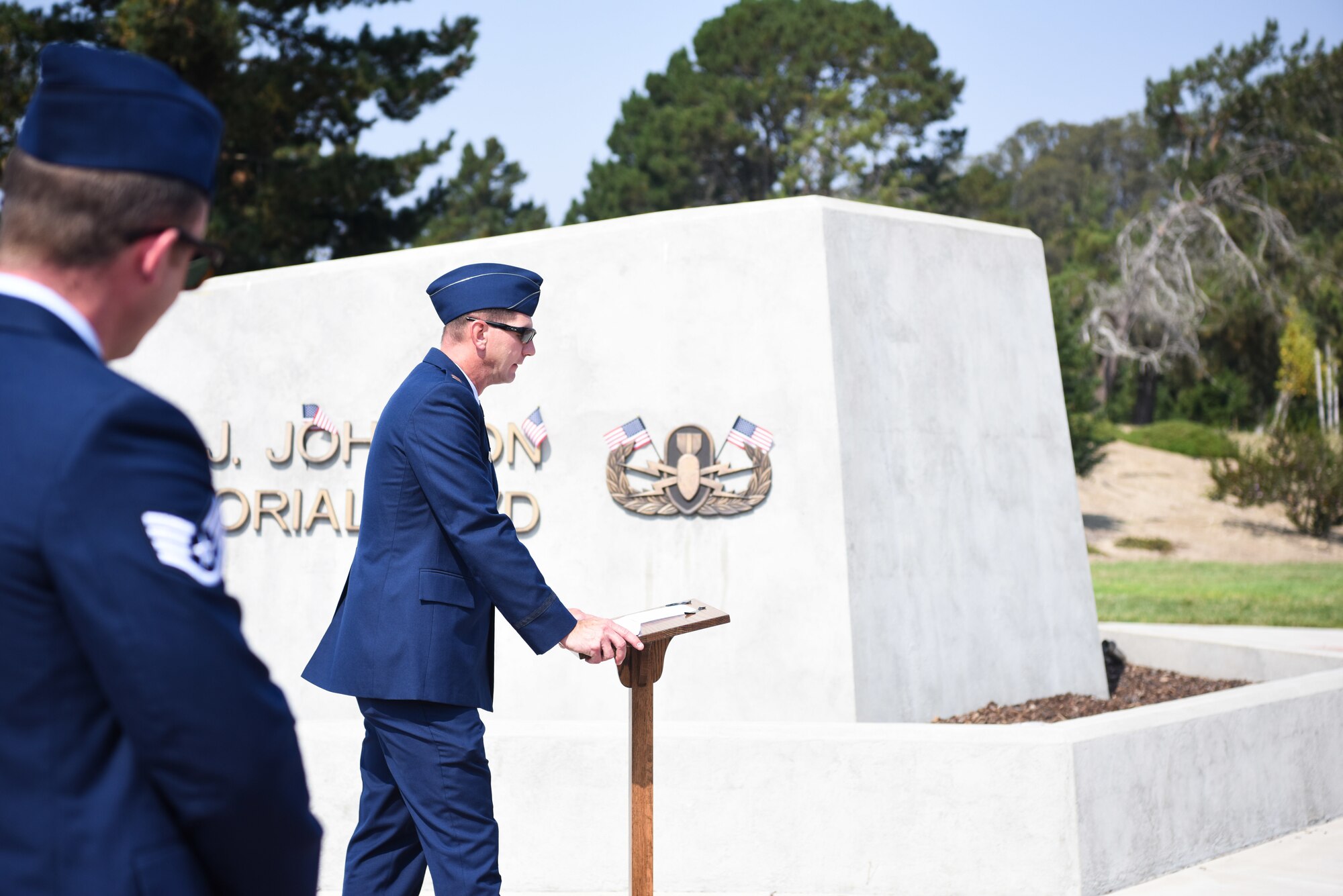 Capt. Douglas Dixon, 30th Space Wing Chaplain, gives the invocation during the 10 year anniversary wreath laying ceremony, honoring the life of Senior Airman Daniel Johnson Oct. 4, 2020, at Vandenberg Air Force Base, Calif. Johnson was a 30th Civil Engineer Squadron Explosive Ordinance Disposal Airman assigned to Vandenberg AFB who was killed on duty during a deployment to Kandahar Airfield, Afghanistan, in support of Operation Locating Bravo in 2010. Johnson is survived by his wife, mother, father and brothers. (U.S. Space Force photo by Senior Airman Hanah Abercrombie)