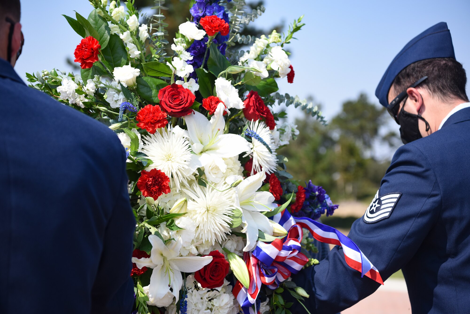 30th Civil Engineer Squadron Explosive Ordinance Disposal Airmen and family members lay a wreath during the 10 year anniversary wreath laying ceremony honoring the life of Senior Airman Daniel Johnson Oct. 4, 2020, at Vandenberg Air Force Base, Calif. Johnson was killed on duty during a deployment to Kandahar Airfield, Afghanistan, in support of Operation Locating Bravo in 2010. While deployed, he was single-handedly responsible for saving the life of an Afghan National Army Soldier, who was injured by a concealed booby-trap. To honor Johnson, Vandenberg AFB has named a road and dedicated a monument for him at the base entrance. (U.S. Space Force photo by Senior Airman Hanah Abercrombie)