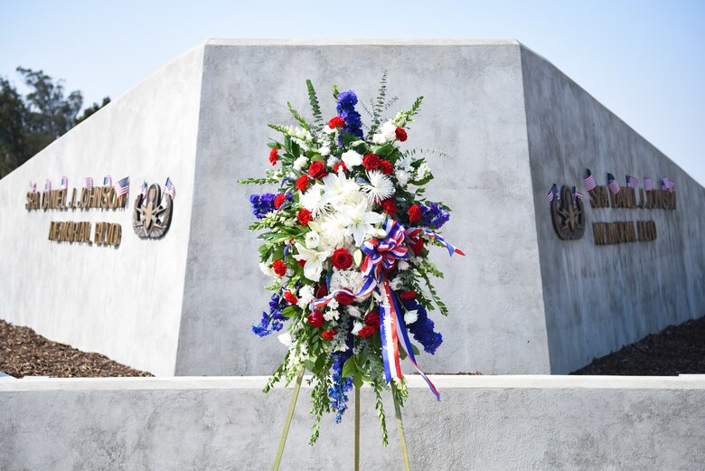 A wreath sits at the memorial of Senior Airman Daniel Johnson to honor his life on the 10th anniversary of his passing, during a wreath laying ceremony Oct. 4, 2020, at Vandenberg Air Force Base, Calif. Johnson was a 30th Civil Engineer Squadron Explosive Ordinance Disposal Airman who was killed on duty during a deployment to Kandahar Airfield, Afghanistan, in support of Operation Locating Bravo in 2010. Johnson is survived by his wife, mother, father and brothers. (U.S. Space Force photo by Senior Airman Hanah Abercrombie)