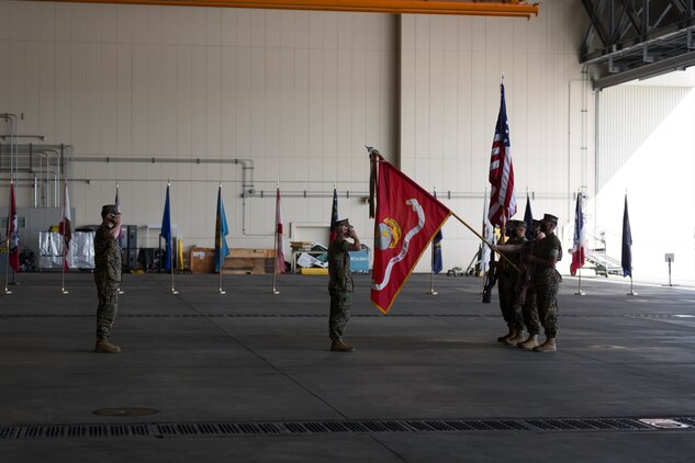 U.S. Marines present colors during the change of command and re-designation of VMFA(AW)-242 at Marine Corps Air Station Iwakuni, Japan, Oct. 16.