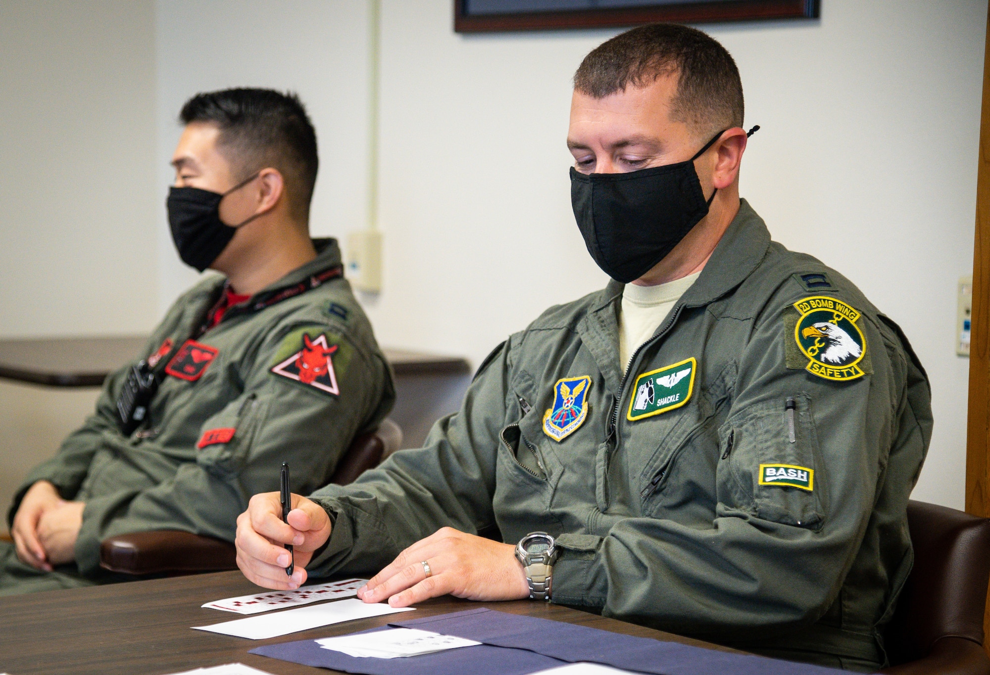 Capt. Dustin Martin, 2nd Bomb Wing weapons systems officer instructor, grades tests in preparation for Global Thunder 21 at Barksdale Air Force Base, La., Oct. 23, 2020. U.S. Strategic Command’s fundamental mission is to deter, detect and prevent strategic attack against the United States, our allies and partners. (U.S. Air Force photo by Senior Airman Lillian Miller)