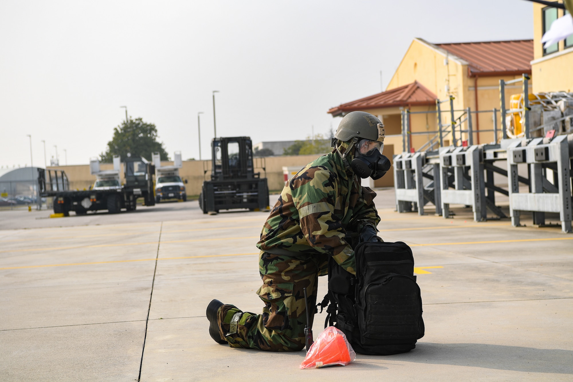 Airman 1st Class Zion Sizemore, 724th Air Mobility Squadron member, pulls equipment out of a bag during exercise Nodal Lightning at Aviano Air Base, Italy, Oct. 21, 2020. Sizemore was part of a Personnel Accountability Report team during the exercise. (U.S. Air Force photo by Airman 1st Class Thomas S. Keisler IV)