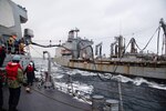 201022-N-TC847-1233 BARENTS SEA (Oct. 22, 2020) The Arleigh Burke-class guided-missile destroyer USS Ross (DDG 71) conducts a replenishment at sea with USNS Laramie (T-AO-203), Oct. 22, 2020. Ross is currently on its tenth Forward Deployed Naval Forces-Europe (FDNF-E) patrol in the U.S. 6th Fleet area of operations in support of U.S. national security interests in Europe and Africa. (U.S. Navy photo by Mass Communication Specialist Seaman Christine Montgomery/released)