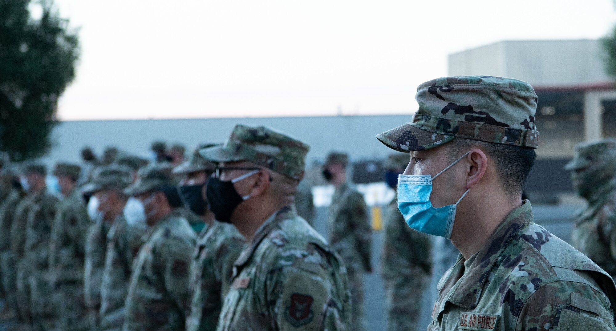 Members of the 55th Aerial Port Squadron line up in formation prior to an assumption of command ceremony on Oct. 24, 2020, at Travis Air Force Base, California. Maj. Nicholas Botich assumed command of the squadron.