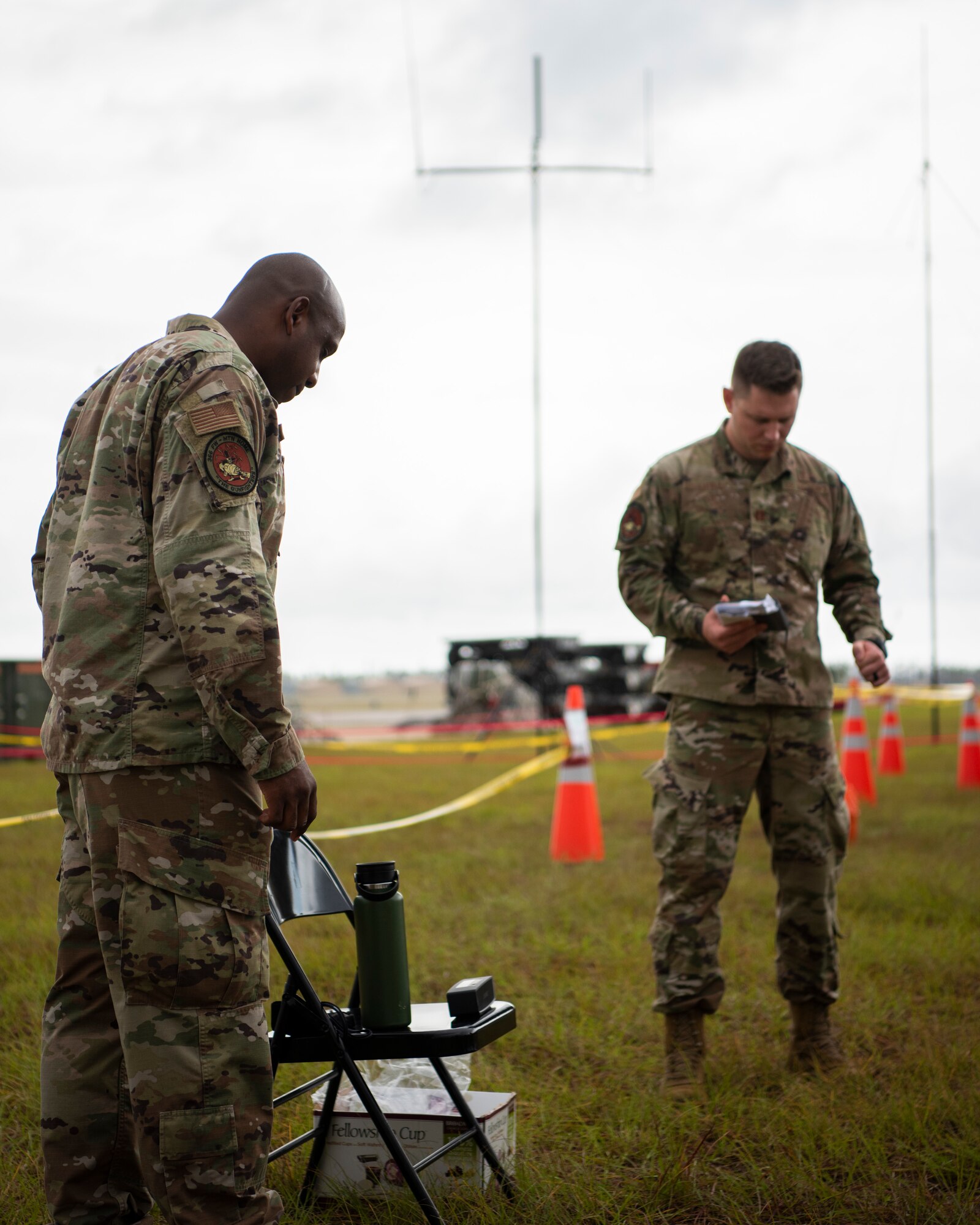 U.S. Air Force Tech. Sgt. Anthony Bean, 366th Fighter Wing religious affairs Airman, and U.S. Air Force Capt. Brent Little, 366th FW chaplain, pray during a protestant service while at Agile Flag 21-1 on Tyndall Air Force Base, Florida, Oct. 24, 2020. Agile Flag 21-1 is an experimental exercise that tests a lead Wing concept in a deployment environment. The Chaplaincy is there to provide morale, resiliency and spiritual care for whoever wants it. (U.S. Air Force photo by Senior Airman Andrew Kobialka)