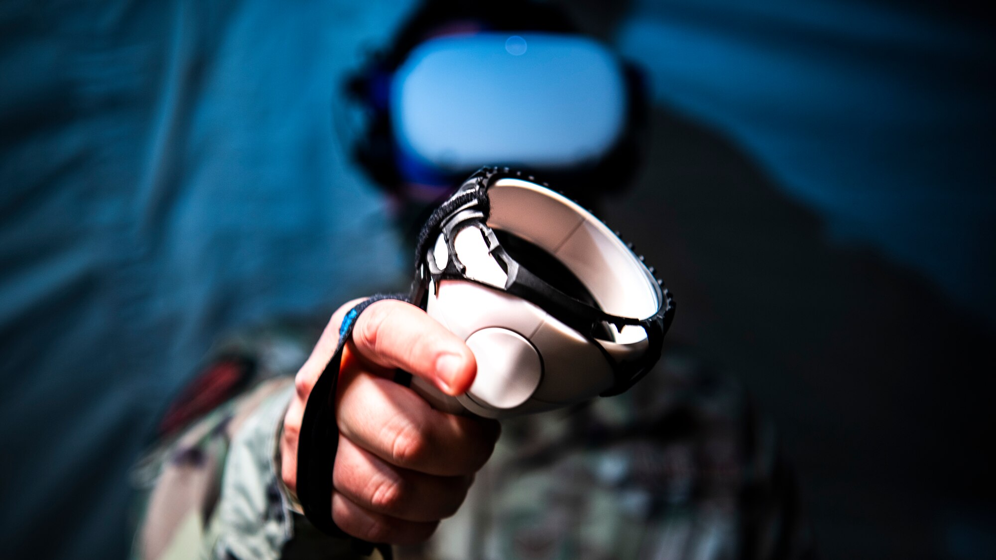 A U.S. Air Force Airman from the 366th Fighter Wing uses virtual reality during Agile Flag 21-1 at Tyndall Air Force Base, Florida, Oct. 23, 2020. Virtual reality is an innovative service provided by the 366th FW chaplaincy that can be used in deployed environments to let Airmen experience environments that hold sentimental value and boost morale. For instance, an Airman can go virtually fishing at their family’s favorite fishing hole. (U.S. Air Force photo by Senior Airman Andrew Kobialka)