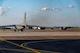 A U.S. Air Force Reserve C-130H Hercules aircraft assigned to the 910th Airlift Wing, based at Youngstown Air Reserve Station, Ohio and equipped with a Modular Aerial Spray System, taxis past a B-52 Stratofortress bomber prior to taking off at Barksdale Air Force Base, Louisiana, Oct. 22, 2020.