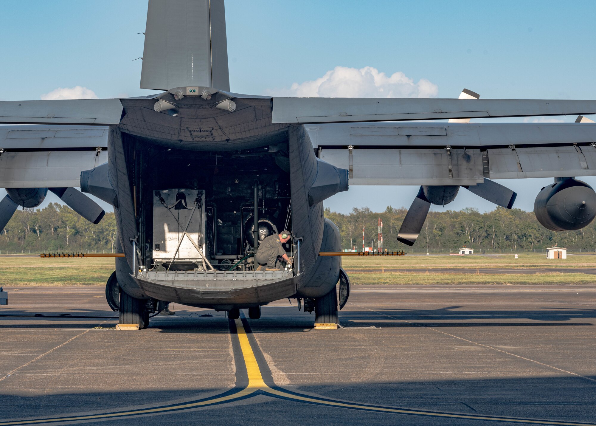 U.S. Air Force Reserve Senior Master Sgt. Mark Zickefoose, a loadmaster assigned to the 910th Operations Group, makes final adjustments on the cargo deck of a C-130H Hercules aircraft assigned to the 910th Airlift Wing, based at Youngstown Air Reserve Station, Ohio and equipped with a Modular Aerial Spray System, prior to take off from Barksdale Air Force Base, Louisiana, Oct. 22, 2020.