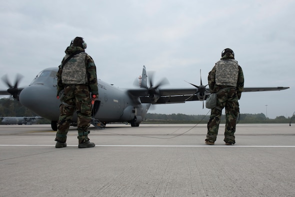 Airmen perform flight checks.