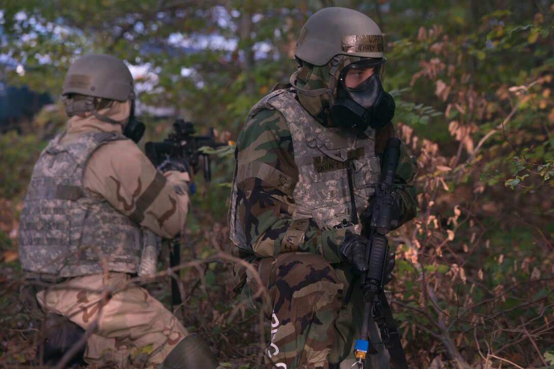 An Airman searches for adversaries during an exercise.