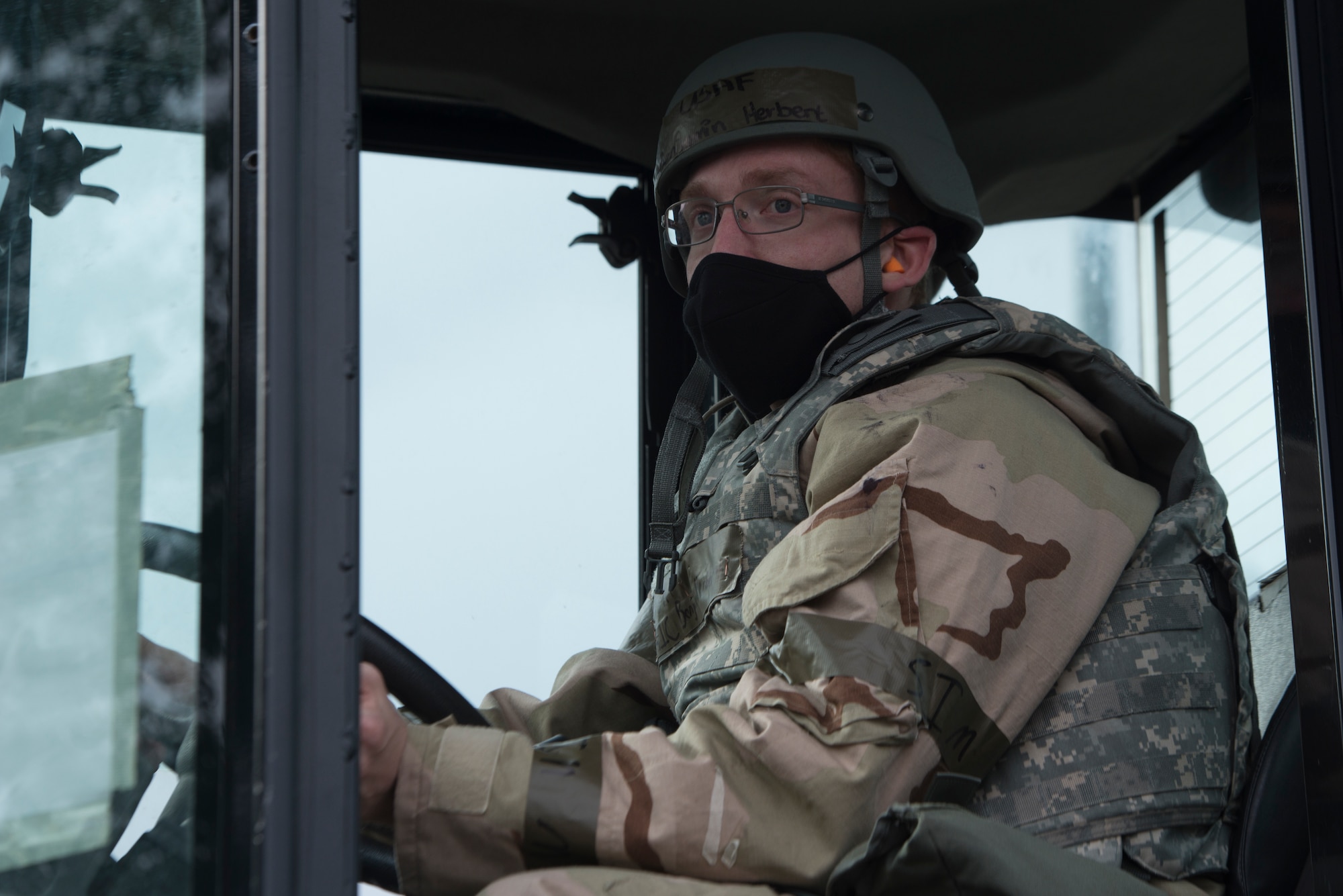 An Airman directs a forklift to a billeting kit.