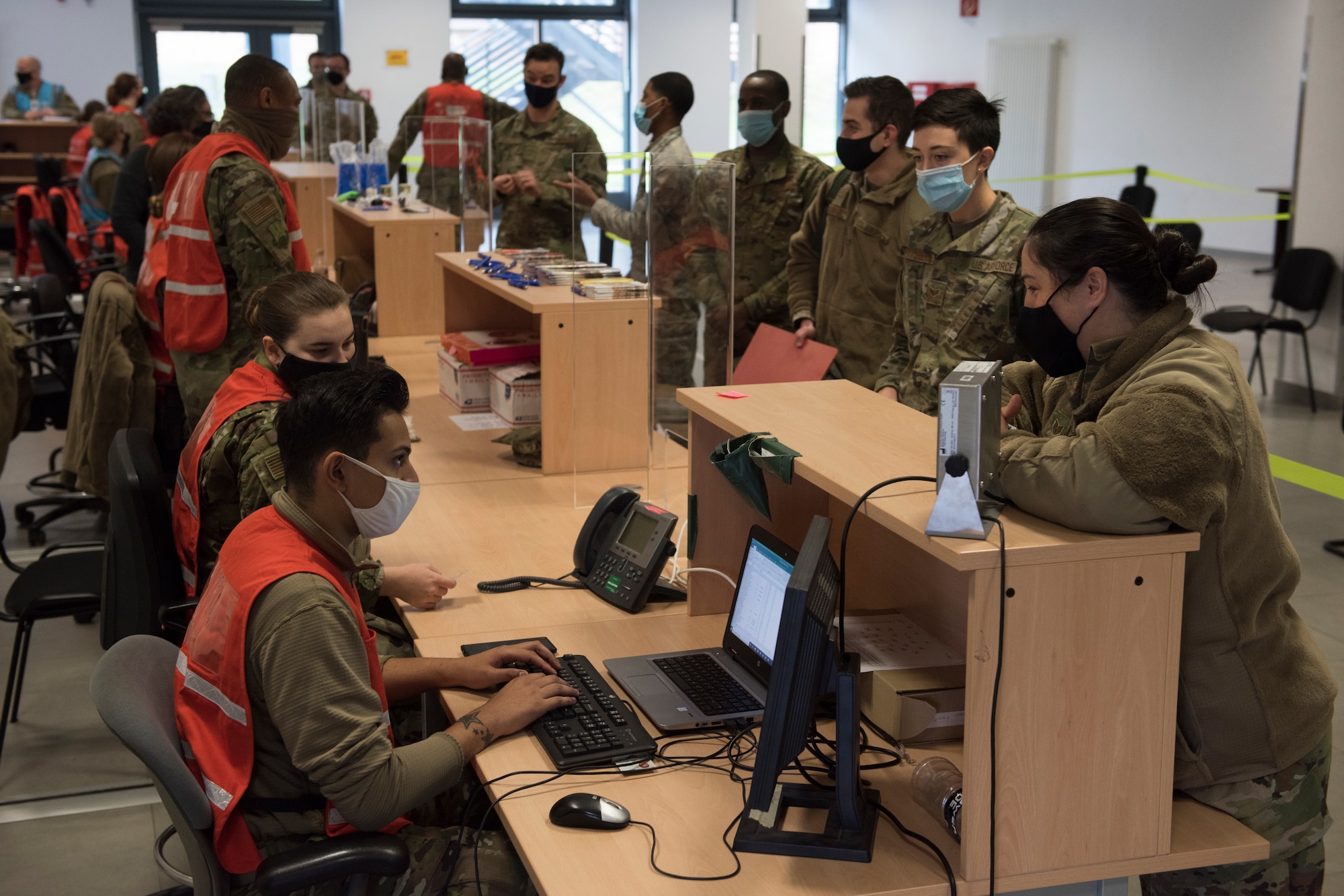 Airmen simulate pre-deployment procedures.