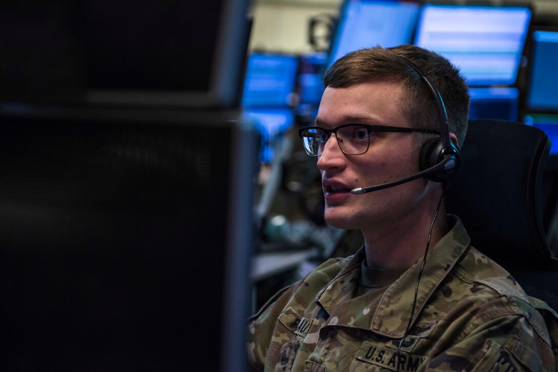 U.S. Army 1st Lt. Andrew Plautz, 11th Air Defense Artillery (ADA) Brigade ADA fire control officer, relays information during Air Missile and Defense Exercise (AMDEX) 21-1 at Al Dhafra Air Base, United Arab Emirates, Oct. 23, 2020.