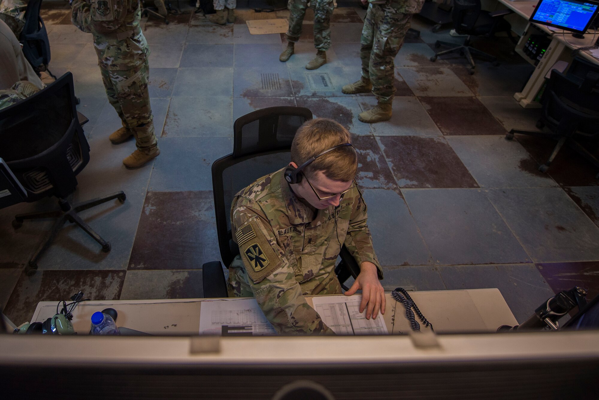U.S. Army 1st Lt. Andrew Plautz, 11th Air Defense Artillery (ADA) Brigade ADA fire control officer, monitors information during Air Missile and Defense Exercise (AMDEX) 21-1 at Al Dhafra Air Base, United Arab Emirates, Oct. 23, 2020.