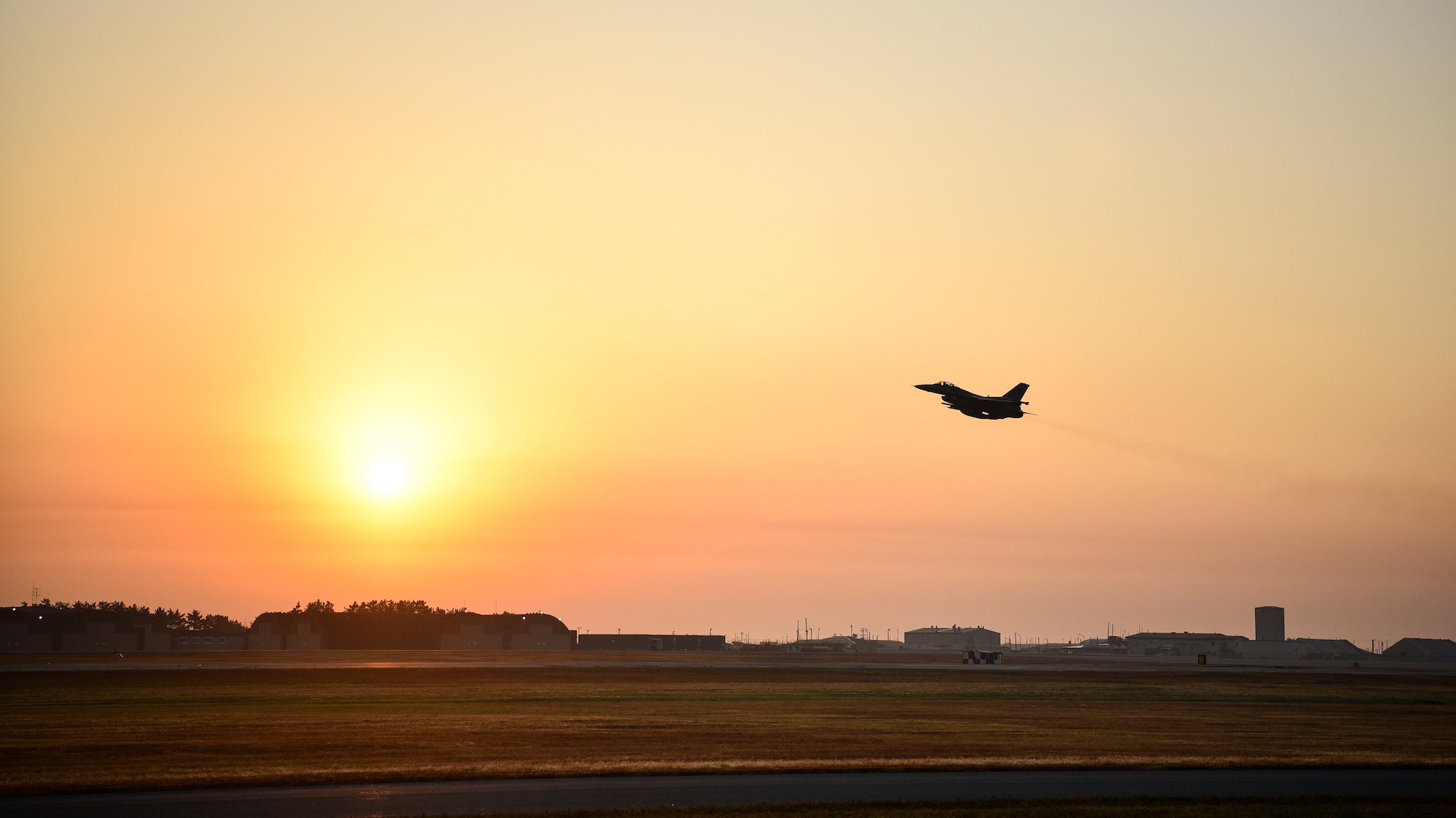 A photo of a fighter jet taking off.