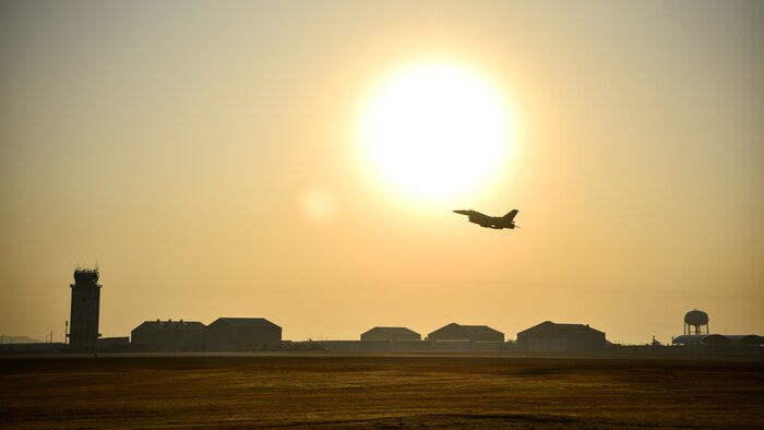 A photo of a fighter jet taking off.